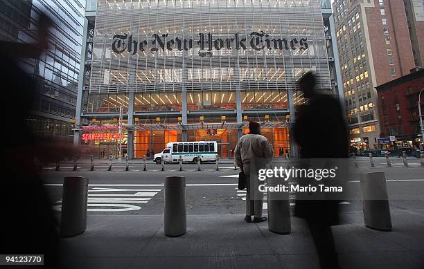 The New York Times' masthead is displayed in front of the midtown headquarters on December 7, 2009 in New York City. Today is the deadline for Times...