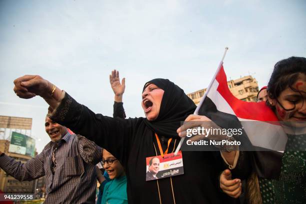 Supporters of Egyptian President Abdel Fattah al-Sisi celebrate at Tahrir square after the presidential election results were announced, in Cairo,...