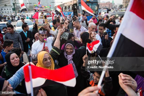 Supporters of Egyptian President Abdel Fattah al-Sisi celebrate at Tahrir square after the presidential election results were announced, in Cairo,...