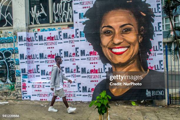 Wheat-paste piece of street art by artist Luis Bueno shows the councilwoman from Rio de Janeiro Marielle Franco. On March 14th, the councilwoman from...