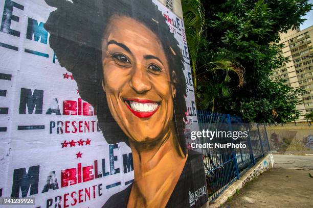 Wheat-paste piece of street art by artist Luis Bueno shows the councilwoman from Rio de Janeiro Marielle Franco. On March 14th, the councilwoman from...