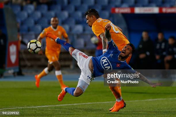 Os Belenenses Forward Diogo Viana from Portugal and FC Porto Forward Francisco Soares from Brazil during the Premier League 2017/18 match between CF...