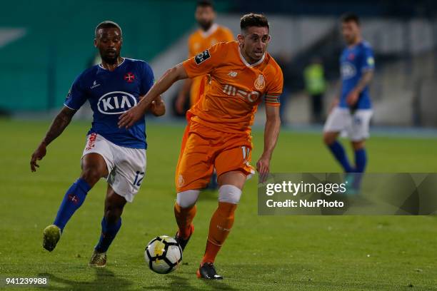 Porto Midfielder Hector Herrera from Mexico and CF Os Belenenses Forward Fredy from Angola during the Premier League 2017/18 match between CF Os...