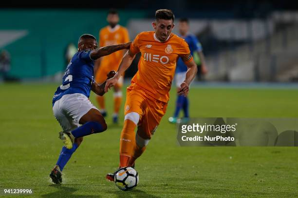Porto Midfielder Hector Herrera from Mexico and CF Os Belenenses Forward Fredy from Angola during the Premier League 2017/18 match between CF Os...