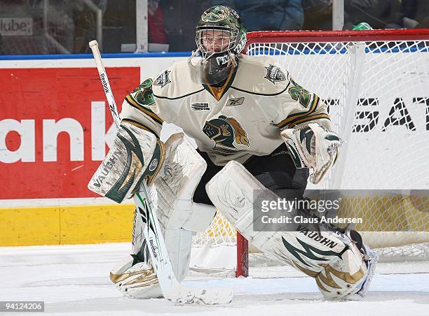 Michael Houser of the London Knights keeps an eye on the play in a game against the Sault Greyhounds on December 6,2009 at the John Labatt Centre in...