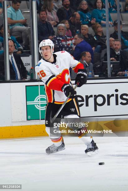 Michael Stone of the Calgary Flames passes the puck against the San Jose Sharks at SAP Center on March 24, 2018 in San Jose, California. Michael Stone