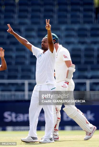 South African bowler Vernon Philander celebrates the dismissal of Australian batsman Pat Cummins on the fourth day of the fifth Test cricket match...