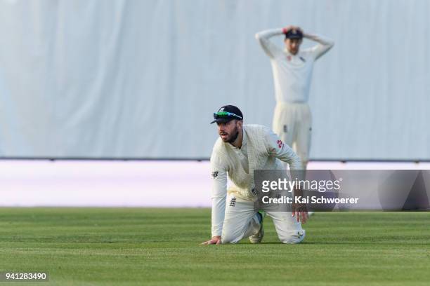 James Vince of England reacts after missing a catch during day five of the Second Test match between New Zealand and England at Hagley Oval on April...