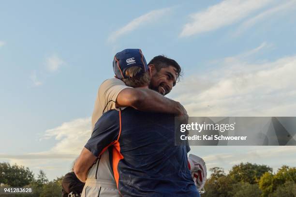 Ish Sodhi of New Zealand is congratulated by captain Kane Williamson of New Zealand at the end of day five of the Second Test match between New...