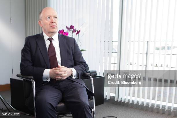 John Cryan, chief executive officer of Deutsche Bank AG, pauses during a Bloomberg Television interview at the Deutsche Bank offices in London, U.K.,...