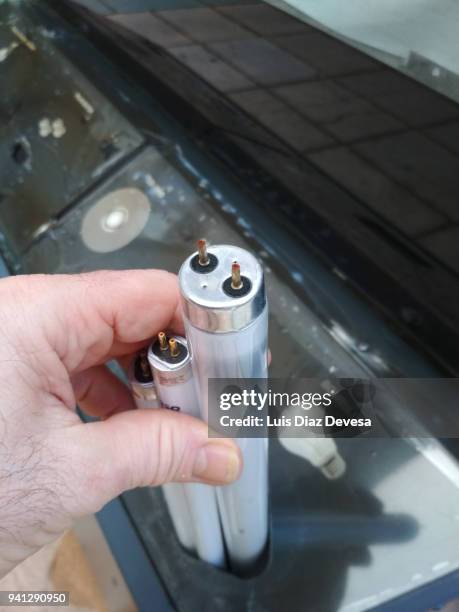 recycling pipe of fluorescent light - fluorescent light bulb stock pictures, royalty-free photos & images