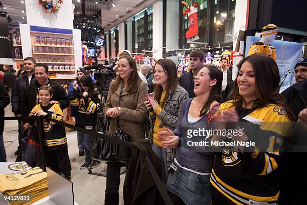 Milan Lucic fans applaud while he speaks at NHL Store on December 7, 2009 in New York City. Lucic is in New York promoting the NHL's Winter Classic...