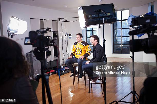 Milan Lucic , left wing for the Boston Bruins, is interviewed by VH1's Jim Shearer at the Bryant Park Hotel on December 7, 2009 in New York City....