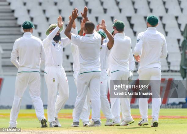 Vernon Philander Celebrates with teammates after taking a wicket during day 5 of the 4th Sunfoil Test match between South Africa and Australia at...