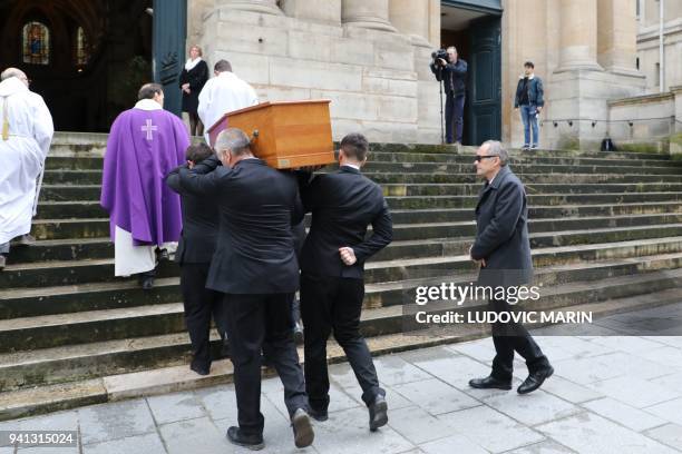 French actor Thomas Chabrol follows pallbearers carrying the coffin of his mother late actress Stephane Audran during the funeral ceremony on April 3...