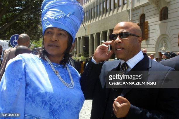 Winnie Madikizela-Mandela , ex-wife of former South African president Nelson Mandela, who is facing a fraud and theft trial involving 100,000 US...