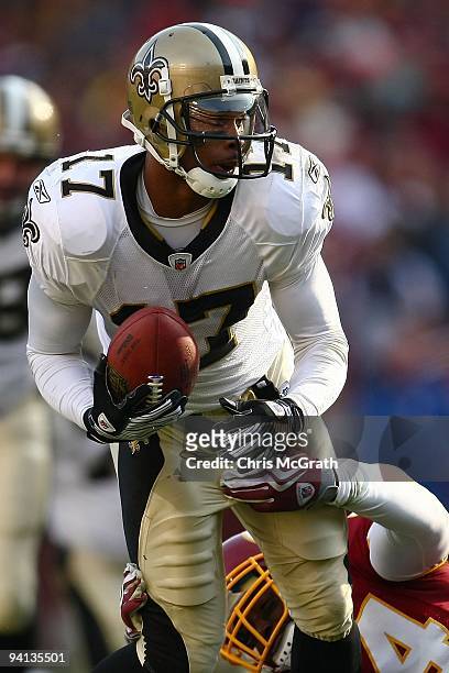 Robert Meachem of the New Orleans Saints makes a break against the Washington Redskins on December 6, 2009 at FedExField in Landover, Maryland.