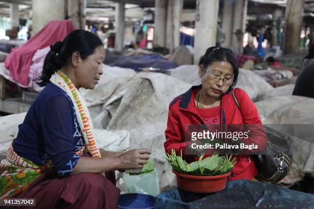 Selling areca nut. A market exclusively run by women it is called the Ima Market or the 'Mothers Market'. The market situated in the heart of the...