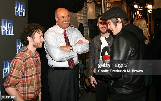 Recording artist Mike Einziger, Dr. Phil McGraw and recording artists Jordan McGraw and Zachary Merrick attend the taping of the "Dr. Phil"...