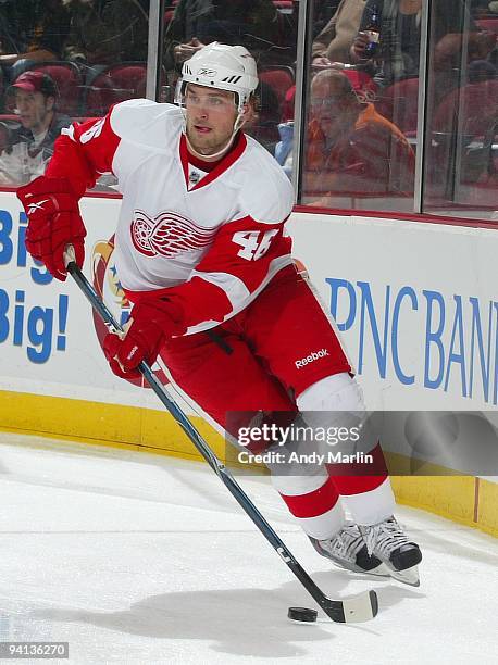 Jakub Kindl of the Detroit Red Wings plays the puck against the New Jersey Devils during their game at the Prudential Center on December 5, 2009 in...