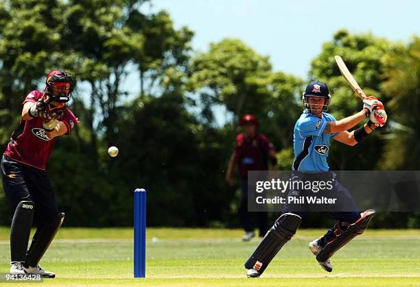 Reece Young of the Auckland Aces cuts the ball past wicketkeeper Peter McGlashan of the Northern Knights during the one day match between the...