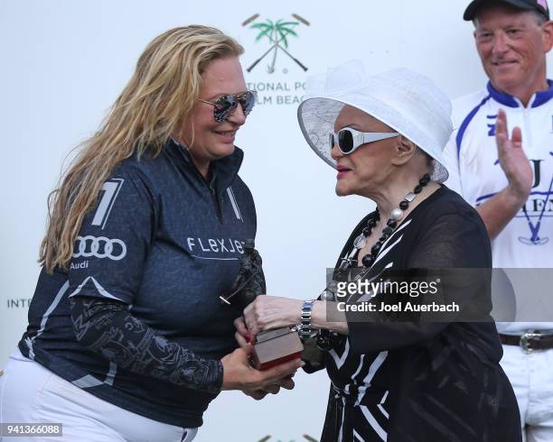 Connie Francis talks to Melissa Ganzi of FlexJet during the awards presentation after their loss to Valiante at the USPA Gold Cup Final on April 1,...