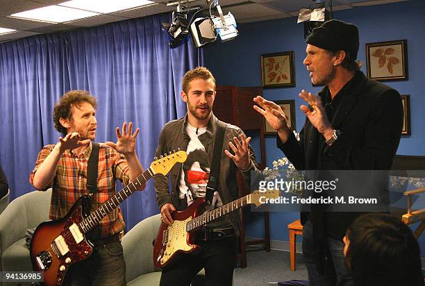 Recording artist Mike Einziger, Jordan McGraw and Chad Smith talk at the taping of the "Dr. Phil" television show, announcing "Little Kids Rock...