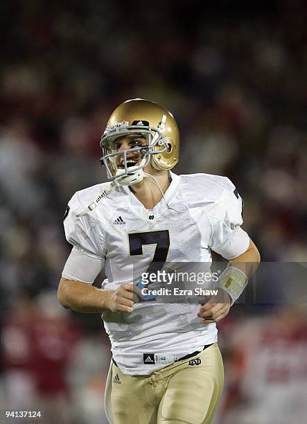 Jimmy Clausen of the Notre Dame Fighting Irish in action during their game against the Stanford Cardinal at Stanford Stadium on November 28, 2009 in...