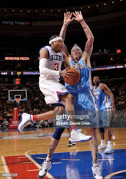 Allen Iverson of the Philadelphia 76ers shoots against Chris Andersen of the Denver Nuggets during the game on December 7, 2009 at the Wachovia...
