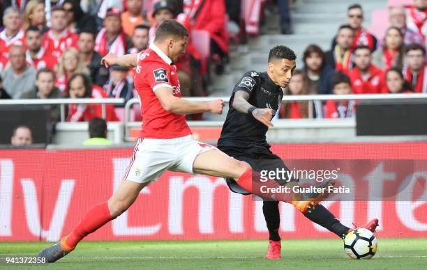 Vitoria Guimaraes forward Raphinha from Brazil with SL Benfica defender Ruben Dias from Portugal in action during the Primeira Liga match between SL...