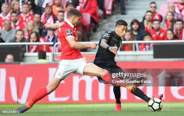 Vitoria Guimaraes forward Raphinha from Brazil with SL Benfica defender Ruben Dias from Portugal in action during the Primeira Liga match between SL...