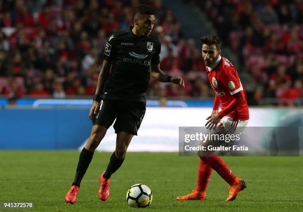 Vitoria Guimaraes forward Raphinha from Brazil with SL Benfica forward Rafa Silva from Portugal in action during the Primeira Liga match between SL...