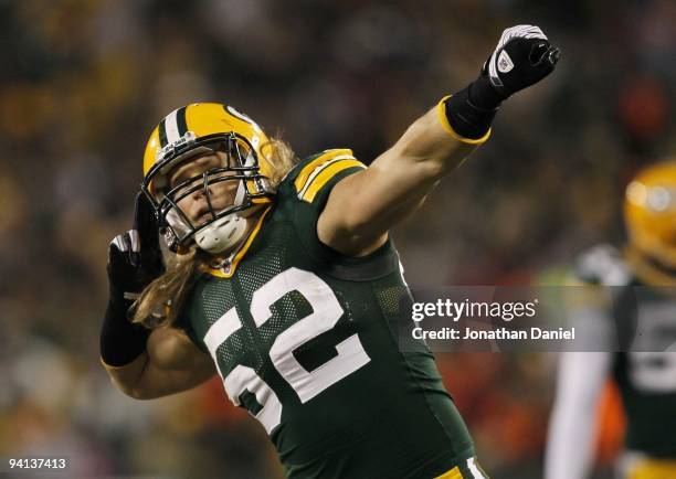 Clay Matthews of the Green Bay Packers celebrates after he sacked Joe Flacco of the Baltimore Ravens in the first half at Lambeau Field on December...