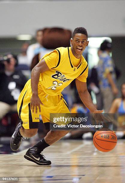 Casper Ware of Long Beach State dribbles the ball upcourt against UCLA during the 76 Classic at Anaheim Convention Center on November 29, 2009 in...