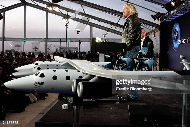 Richard Branson, chairman of Virgin Group Ltd., addresses the media during the unveiling of the Virgin Galactic Spaceship 2, the world's first...