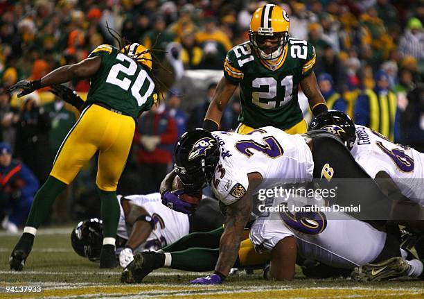 Willis McGahee of the Baltimore Ravens scores a 1-yard touchdown run in the third quarter against the Green Bay Packers at Lambeau Field on December...