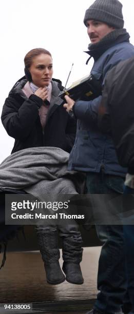 Actress Natalie Portman and director Darren Aronofsky work on the set of the movie "Black Swan" on location on the streets of Manhattan on December...