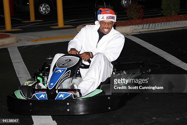 Joe Johnson of the Atlanta Hawks drives a go-kart to his Santa-Lanta Holiday Event at Andretti Karting & Games Center on December 7, 2009 in...