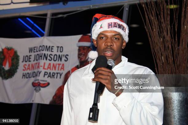 Joe Johnson of the Atlanta Hawks speaks at his Santa-Lanta Holiday Event at Andretti Karting & Games Center on December 7, 2009 in Alpharetta,...