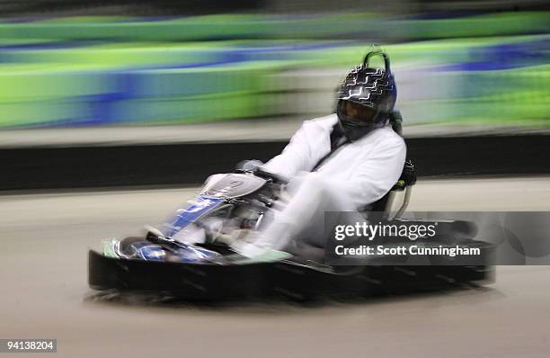 Joe Johnson of the Atlanta Hawks races a go-kart at his annual Santa-Lanta Holiday Event at Andretti Karting & Games Center on December 7, 2009 in...