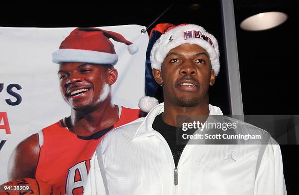 Joe Johnson of the Atlanta Hawks speaks at his annual Santa-Lanta Holiday Event at Andretti Karting & Games Center on December 7, 2009 in Alpharetta,...