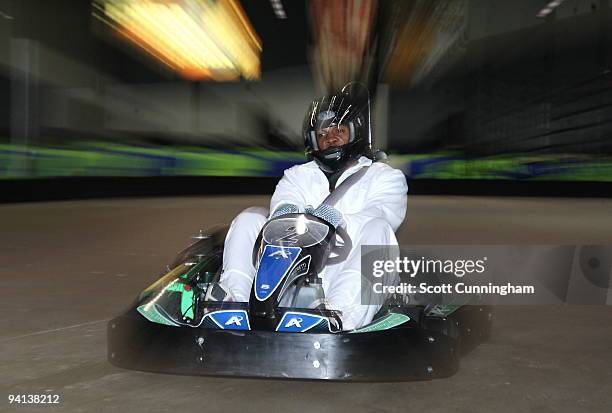 Joe Johnson of the Atlanta Hawks drives a go-kart at his annual Santa-Lanta Holiday Event at Andretti Karting & Games Center on December 7, 2009 in...