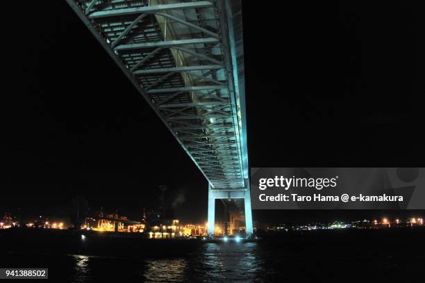 yokohama bay bridge in yokohama port in kanagawa prefecture in japan - yokohama bay bridge stock pictures, royalty-free photos & images