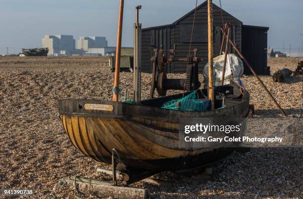 dungeness nuclear power station and fishing boat - gary colet stock pictures, royalty-free photos & images