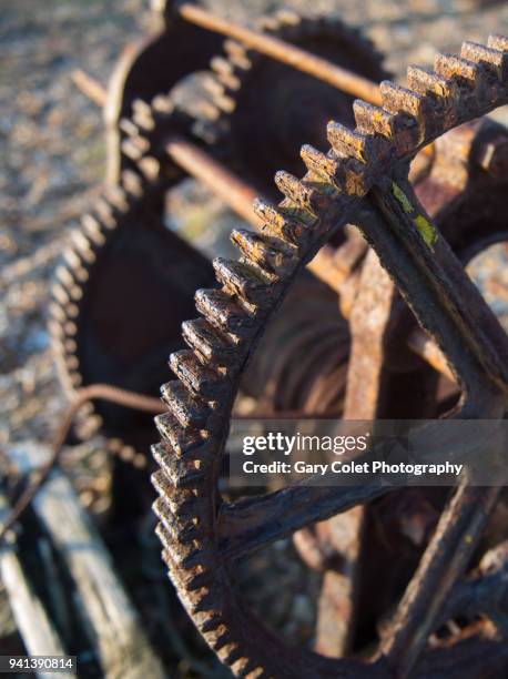 disused rusty beach winch - gary colet stock pictures, royalty-free photos & images