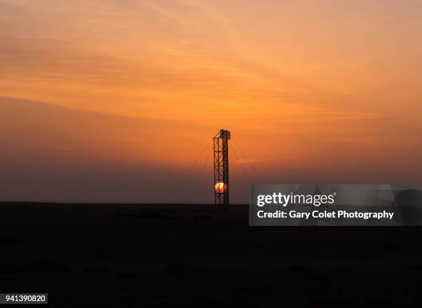 old wooden navigation tower at sunrise - gary colet stock pictures, royalty-free photos & images