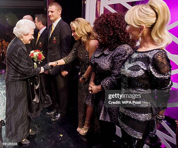 Queen Elizabeth II meets singers Anastasia , Chaka Khan and Lulu following the Royal Variety Performance on December 7, 2009 in Blackpool, England