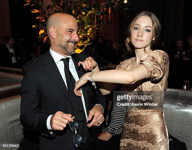 Actors Stanley Tucci and Saoirse Ronan pose at the after party for the premiere of Paramount Pictures' "The Lovely Bones" at the Roosevelt Hotel on...
