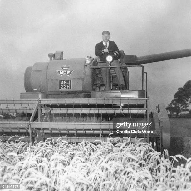 Newly-appointed British Minister of Agriculture James Prior harvesting the wheat crop on his farm at Brampton, Suffolk, 17th August 1970.