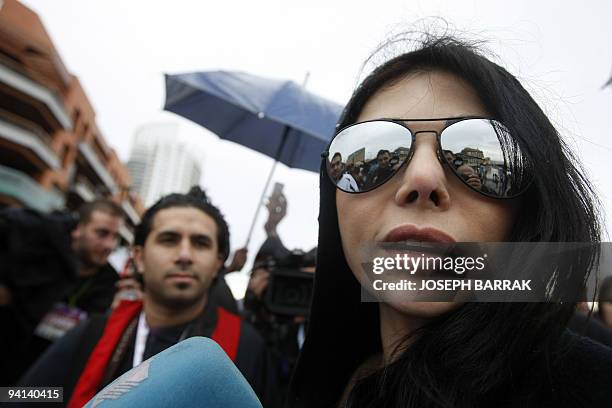 Lebanese pop star Haifa Wehbe takes part in the annual Beirut Marathon on December 6, 2009. AFP PHOTO/JOSEPH BARRAK